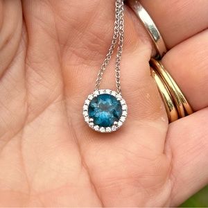 A stunning Natural London Blue Topaz Necklace in White Good and Diamonds.